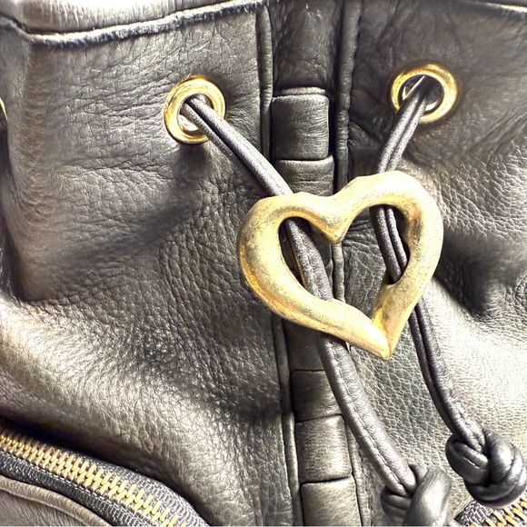 Chic Black Leather Backpack with Gold Accents - Picture 3 of 10